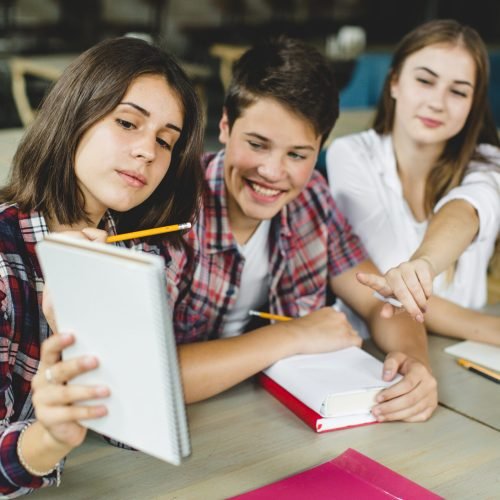 cheerful-students-playing-classroom